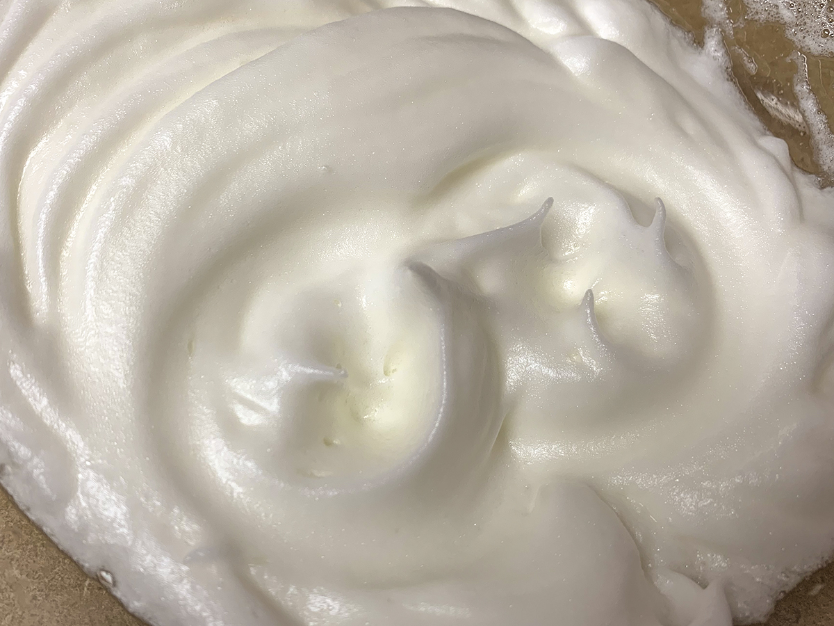 Closeup of stiff peaks in a meringue.