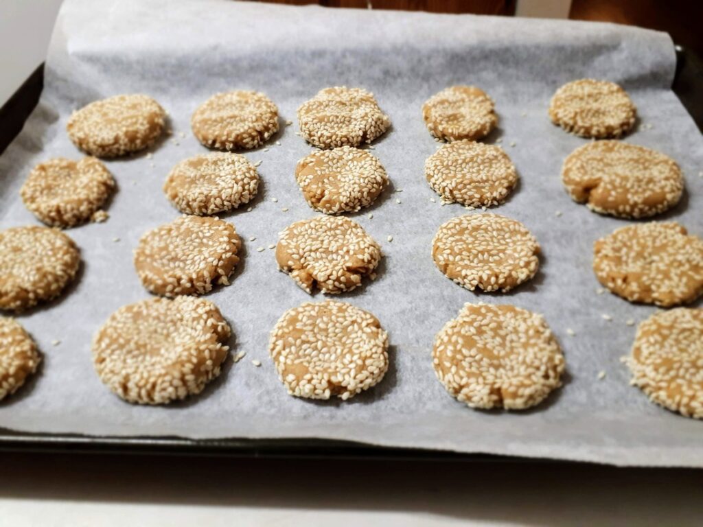 Tahini cookies on baking sheet.