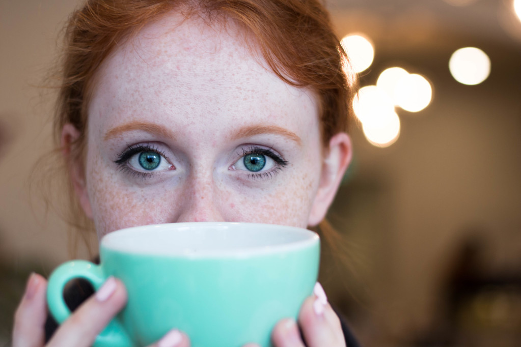 Girl having a cup of tea